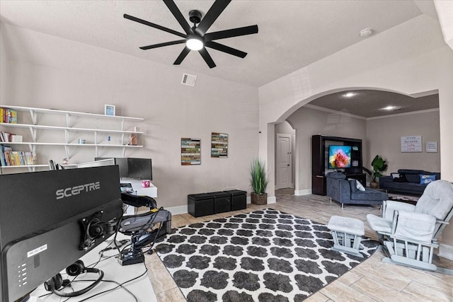 20012 Fm 523, Angleton, TX 77515 - living room featuring arched walkways and a ceiling fan