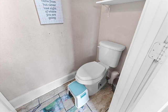 20012 Fm 523, Angleton, TX 77515 - bathroom featuring baseboards and toilet