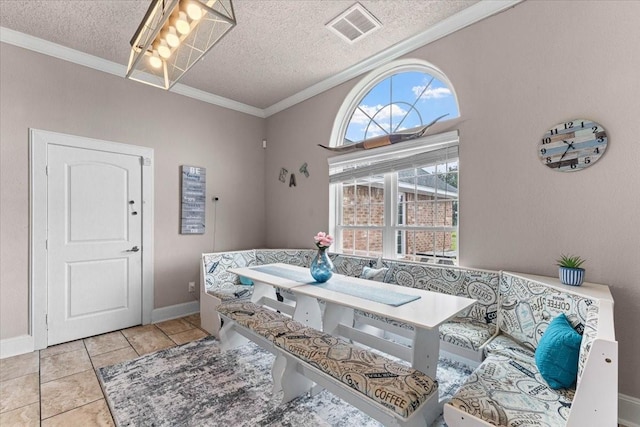 20012 Fm 523, Angleton, TX 77515 - dining area with crown molding, a textured ceiling, and tile patterned flooring
