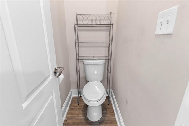 20012 Fm 523, Angleton, TX 77515 - bathroom with toilet and wood finished floors