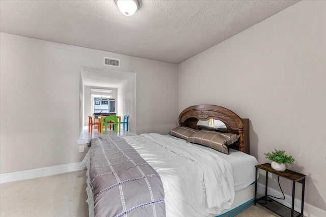 20012 Fm 523, Angleton, TX 77515 - bedroom featuring a textured ceiling and baseboards