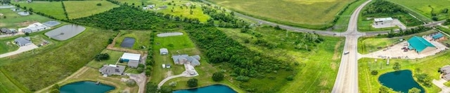 20012 Fm 523, Angleton, TX 77515 - overview of rural landscape with extensive farmland and a nearby body of water