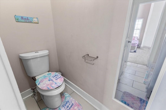 20012 Fm 523, Angleton, TX 77515 - bathroom with toilet and tile patterned flooring