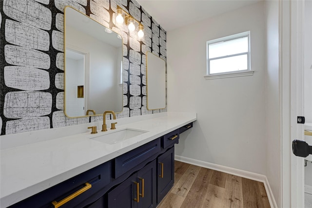 910 Woodchurch Ln, Houston, TX 77073 - bathroom featuring vanity and wood finished floors