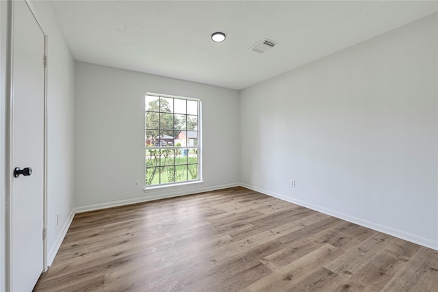 910 Woodchurch Ln, Houston, TX 77073 - empty room with wood finished floors