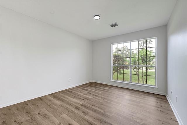910 Woodchurch Ln, Houston, TX 77073 - empty room with wood finished floors and baseboards