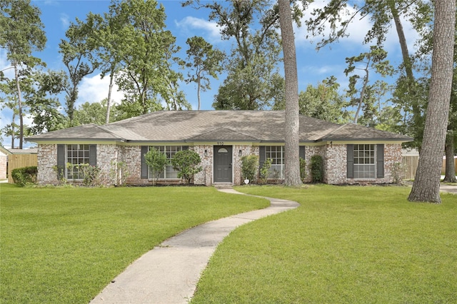 910 Woodchurch Ln, Houston, TX 77073 - single story home with roof with shingles and brick siding