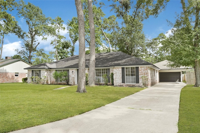 910 Woodchurch Ln, Houston, TX 77073 - view of front of property featuring driveway, a front yard, a garage, and brick siding