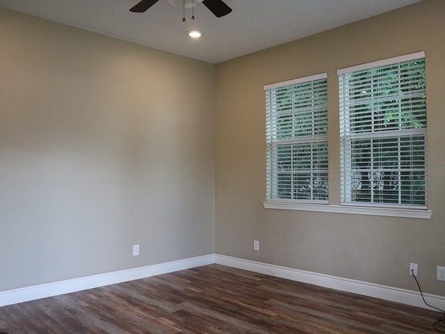 1306 S Austin St, Brenham, TX 77833 - empty room with ceiling fan, dark wood finished floors, and recessed lighting
