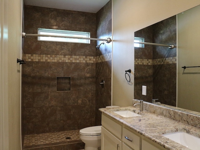 1306 S Austin St, Brenham, TX 77833 - bathroom with tiled shower and double vanity