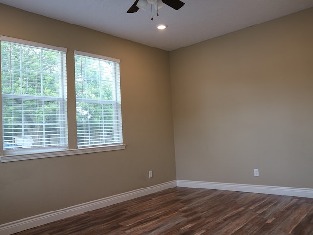 1306 S Austin St, Brenham, TX 77833 - unfurnished room with ceiling fan, dark wood-style floors, and recessed lighting