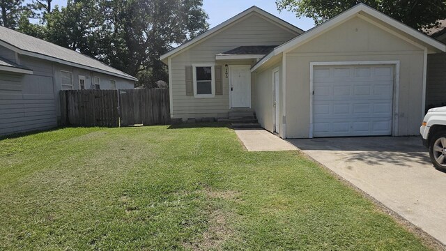 11919 Kingslake Forest Dr, Houston, TX 77044 - view of front of home featuring concrete driveway, a garage, and entry steps