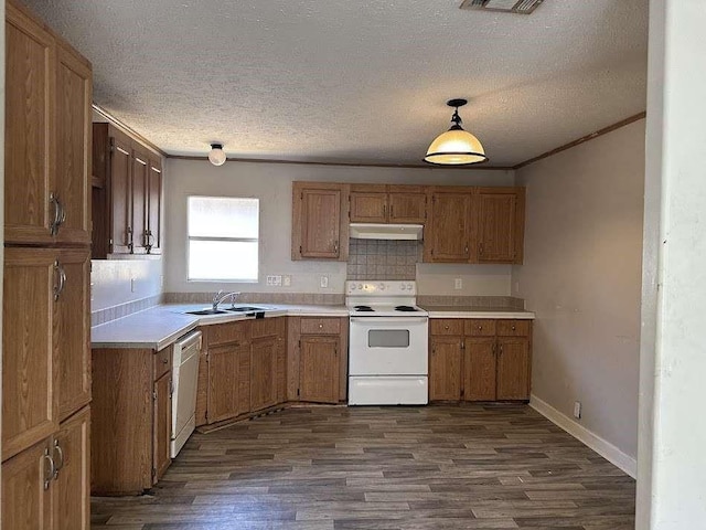 11919 Kingslake Forest Dr, Houston, TX 77044 - kitchen featuring white range with electric cooktop, under cabinet range hood, dark wood-style flooring, a textured ceiling, and light countertops