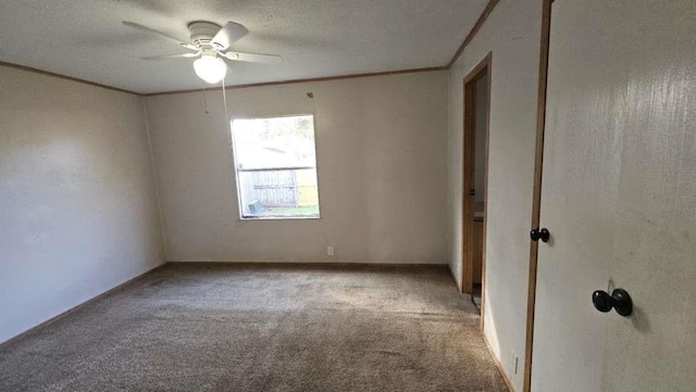 11919 Kingslake Forest Dr, Houston, TX 77044 - spare room featuring carpet, crown molding, and ceiling fan