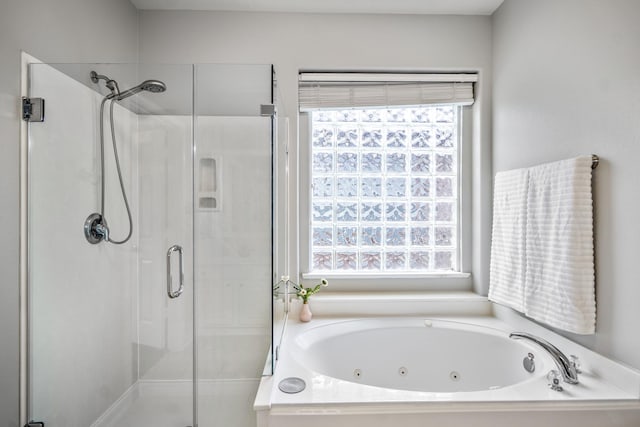 7214 Emerald Run Ln, Spring, TX 77379 - full bathroom with a shower stall and a whirlpool tub