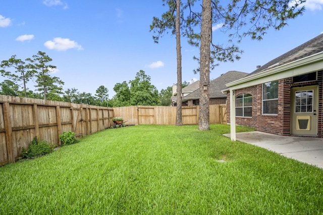 7214 Emerald Run Ln, Spring, TX 77379 - fenced backyard featuring a patio area