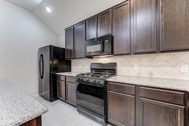 14726 Lark Sky Way, Cypress, TX 77429 - kitchen featuring black appliances, lofted ceiling, tasteful backsplash, dark brown cabinetry, and light tile patterned flooring
