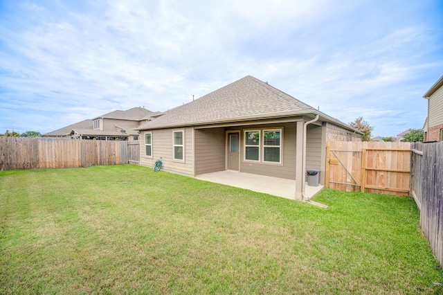 14726 Lark Sky Way, Cypress, TX 77429 - rear view of property featuring a patio area, a fenced backyard, and roof with shingles