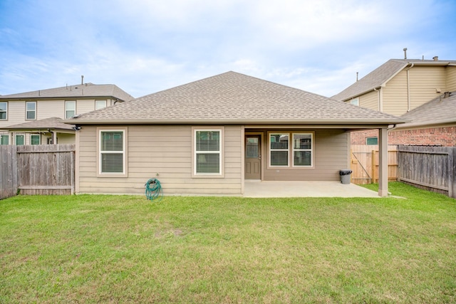 14726 Lark Sky Way, Cypress, TX 77429 - rear view of property featuring a patio area, a fenced backyard, and roof with shingles