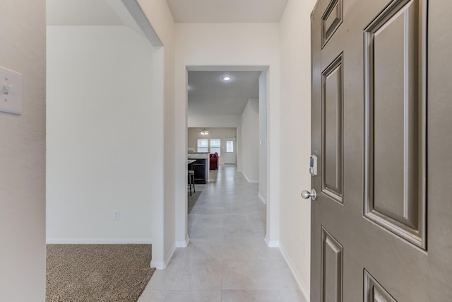 14726 Lark Sky Way, Cypress, TX 77429 - hallway featuring light tile patterned flooring and recessed lighting