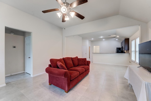 14726 Lark Sky Way, Cypress, TX 77429 - living area with lofted ceiling, ceiling fan, and light tile patterned floors