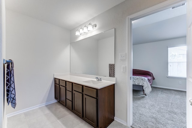 14726 Lark Sky Way, Cypress, TX 77429 - ensuite bathroom with vanity and baseboards