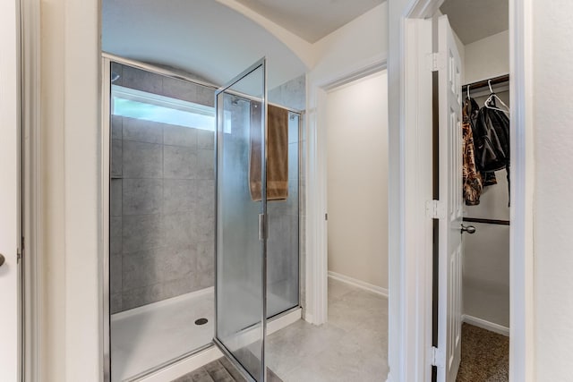 14726 Lark Sky Way, Cypress, TX 77429 - bathroom with a stall shower and a spacious closet