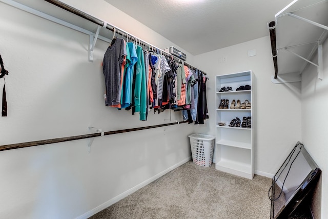 14726 Lark Sky Way, Cypress, TX 77429 - spacious closet featuring carpet flooring