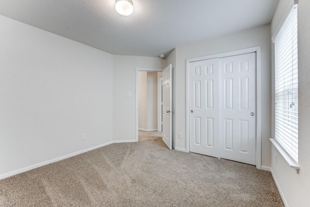 14726 Lark Sky Way, Cypress, TX 77429 - unfurnished bedroom with carpet flooring and a closet