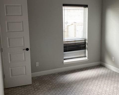 19007 Dappled Mare Cir, Tomball, TX 77377 - carpeted empty room featuring baseboards