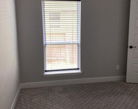 19007 Dappled Mare Cir, Tomball, TX 77377 - spare room with baseboards