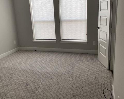19007 Dappled Mare Cir, Tomball, TX 77377 - empty room with healthy amount of natural light