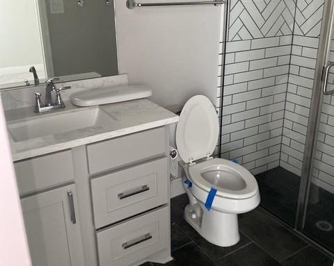 19007 Dappled Mare Cir, Tomball, TX 77377 - bathroom featuring a stall shower, vanity, and tile patterned floors