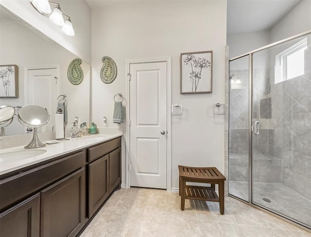 17023 Canosa Dr, Cypress, TX 77433 - full bath featuring double vanity, a stall shower, and tile patterned flooring