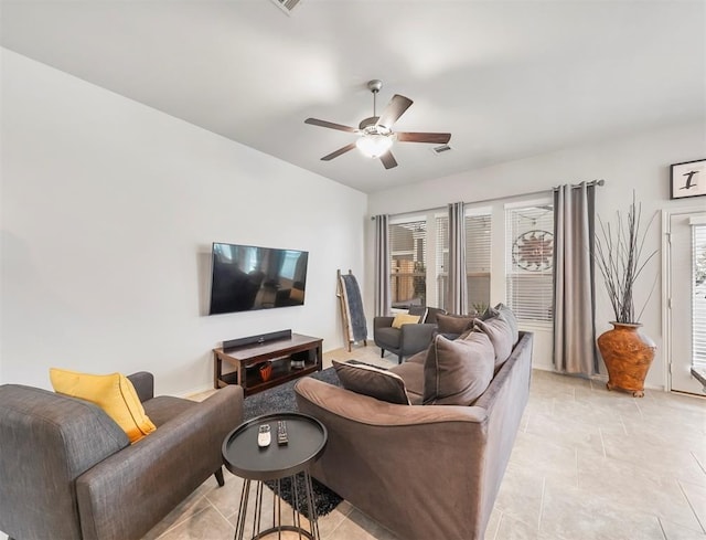 17023 Canosa Dr, Cypress, TX 77433 - living room featuring a ceiling fan, plenty of natural light, and light tile patterned floors