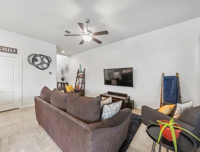 17023 Canosa Dr, Cypress, TX 77433 - living area with ceiling fan and light tile patterned floors