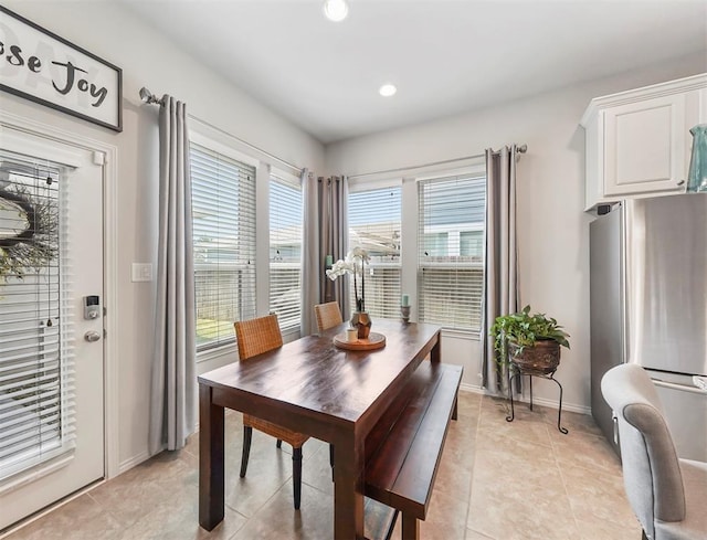 17023 Canosa Dr, Cypress, TX 77433 - dining room featuring recessed lighting and light tile patterned floors