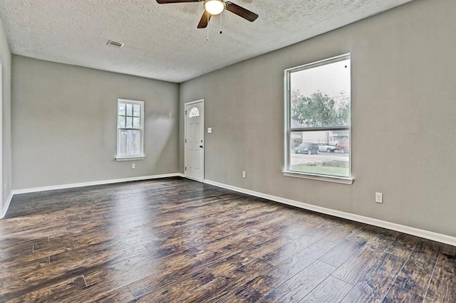 4137 Galesburg St, Houston, TX 77051 - unfurnished room with ceiling fan, dark wood finished floors, and a textured ceiling