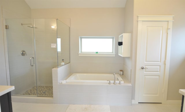 4922 Hoover St Unit A, Houston, TX 77092 - full bathroom with vanity, a bath, a stall shower, and tile patterned flooring