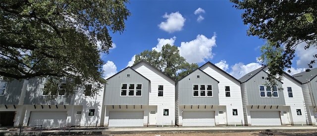 4922 Hoover St Unit A, Houston, TX 77092 - modern inspired farmhouse with a garage and board and batten siding