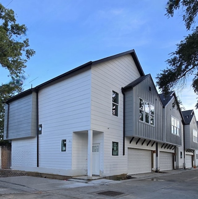 4922 Hoover St Unit A, Houston, TX 77092 - view of property featuring a garage and concrete driveway