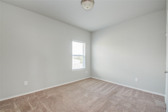 17019 Canosa Dr, Cypress, TX 77433 - spare room featuring light colored carpet and baseboards