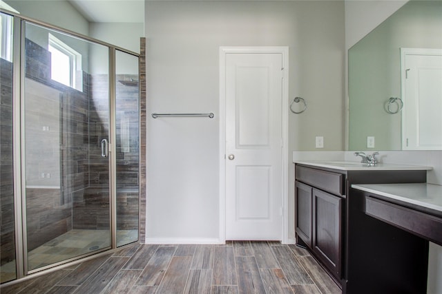 17019 Canosa Dr, Cypress, TX 77433 - full bathroom with vanity, a stall shower, and wood finish floors