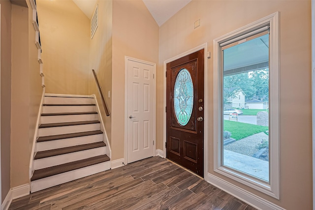 5942 Pebble Springs Dr, Houston, TX 77066 - entrance foyer with dark wood-style floors and stairway