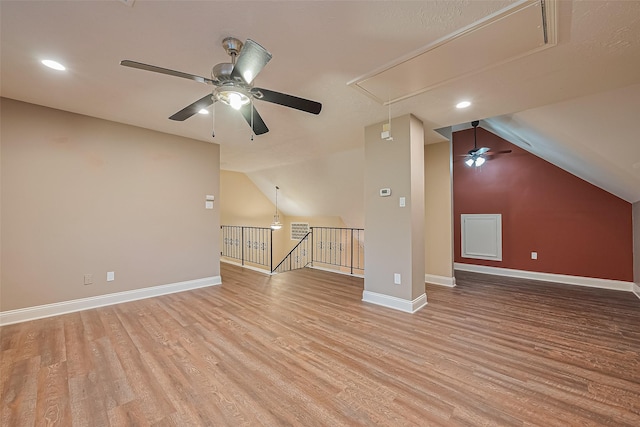 5942 Pebble Springs Dr, Houston, TX 77066 - bonus room featuring attic access, a ceiling fan, light wood-type flooring, lofted ceiling, and recessed lighting