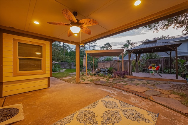 5942 Pebble Springs Dr, Houston, TX 77066 - fenced backyard with a gazebo, a deck, a patio, and ceiling fan