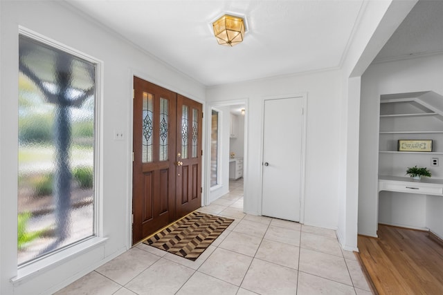 1403 Maygrove Dr, Sugar Land, TX 77498 - entrance foyer featuring light tile patterned floors and baseboards