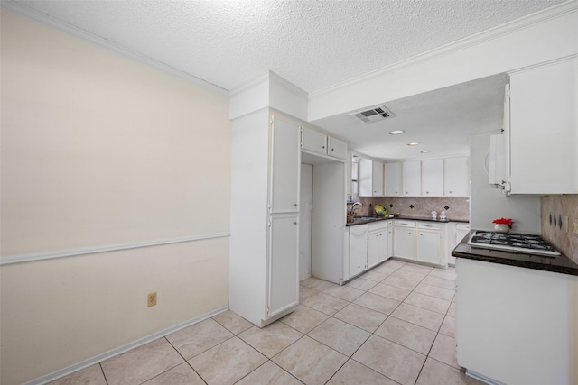 1403 Maygrove Dr, Sugar Land, TX 77498 - kitchen with dark countertops, light tile patterned flooring, white appliances, decorative backsplash, and ornamental molding