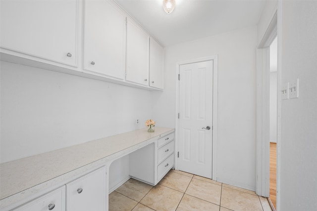 1403 Maygrove Dr, Sugar Land, TX 77498 - unfurnished office with built in study area and light tile patterned flooring