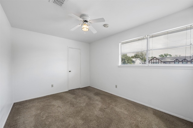 1403 Maygrove Dr, Sugar Land, TX 77498 - carpeted empty room featuring a ceiling fan and a smoke detector